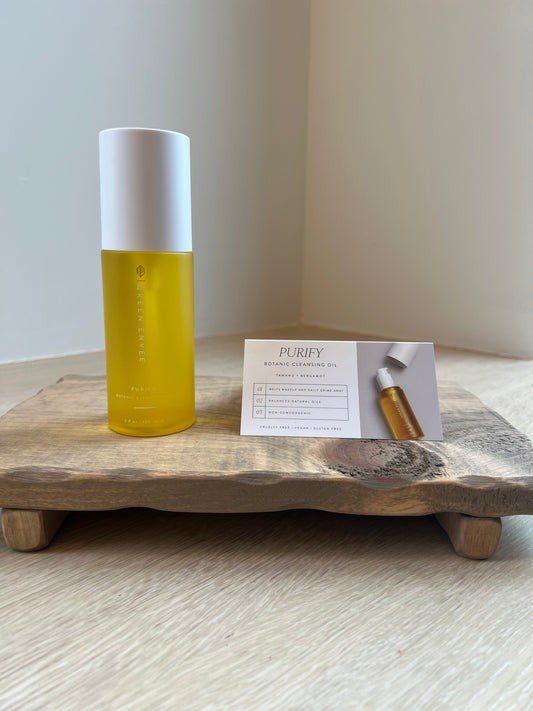 Purify Botanical Cleansing Oil from Green Envee on wooden tray